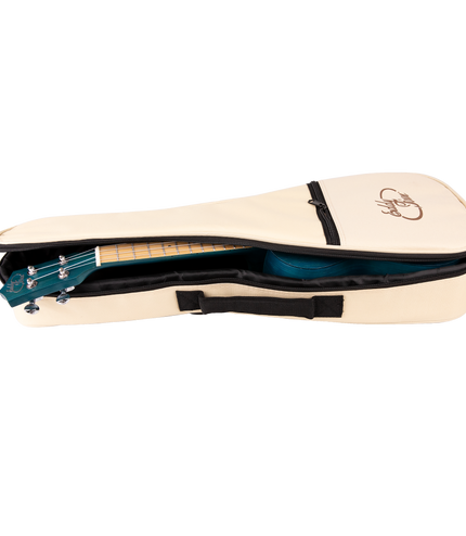 A blue ukulele inside a cream colored gig bag with Eddy Finn branding