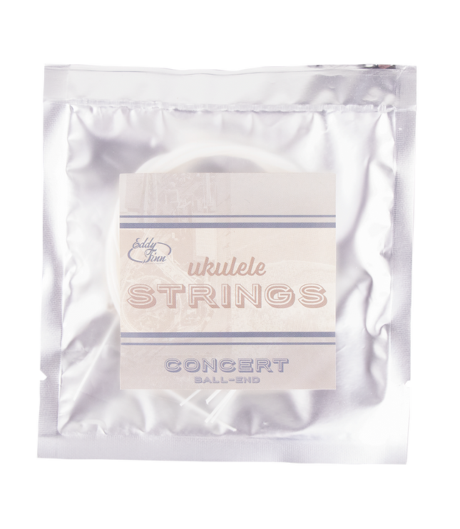 A clear package of concert ukulele strings with silver backing