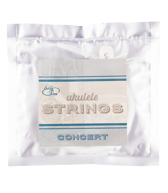 A clear package of concert ukulele strings with silver backing