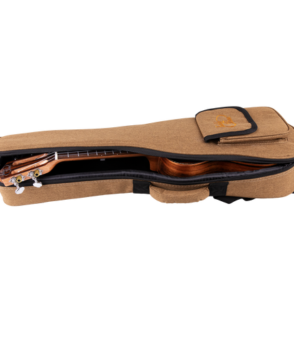 A ukulele inside a tan gig bag with Eddy Finn branding