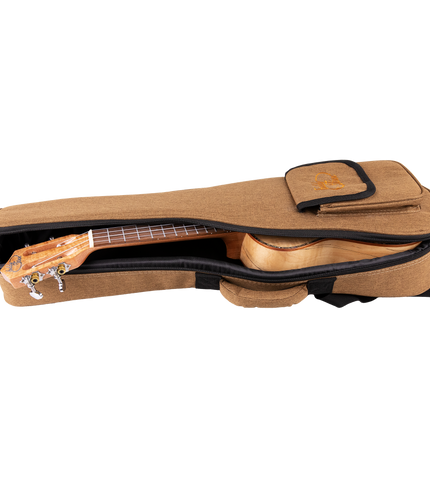 A ukulele inside a tan gig bag with Eddy Finn branding