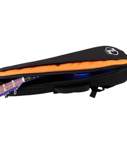 A ukulele inside a black and orange gig bag with Eddy Finn branding